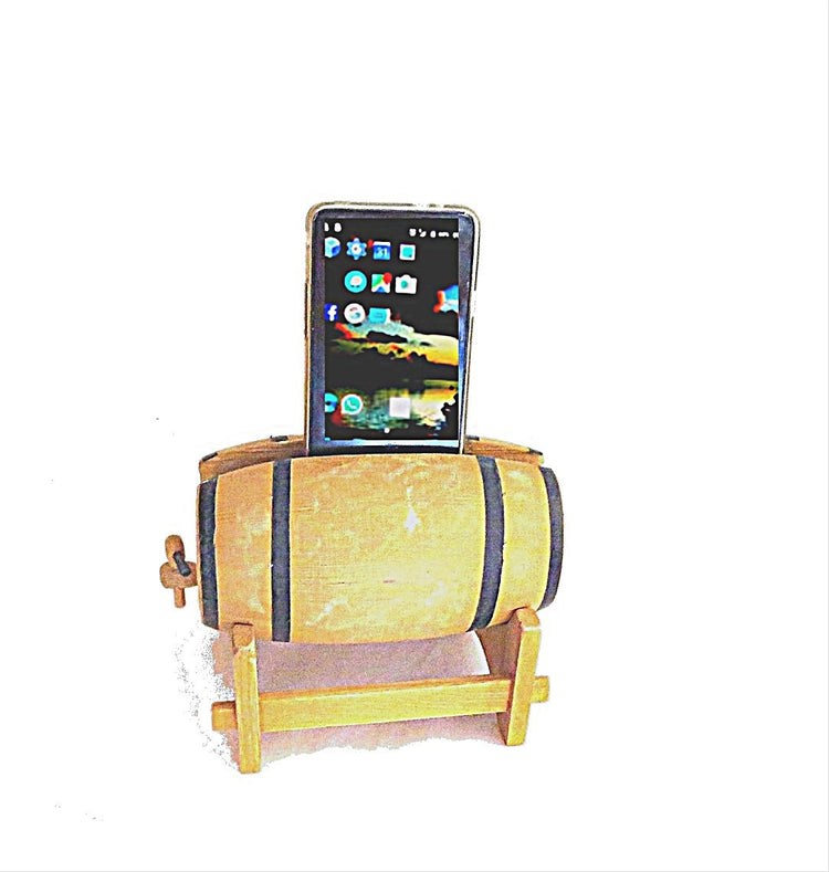 Phone stand. Hand crafted wood. Man cave bar. Cell phone holder. Docking station.Cell phone charging station. Shaped as a wine barrel.