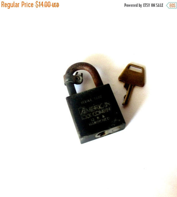Padlock. Old metal lock. Rusty metal. Us army and government official lock. Made by the American lock company. Series 5200. Vintage.