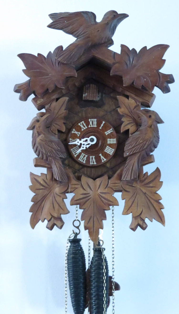 Black forest. Wood clock. Wooden clock. Wood wall clock. Mechanical clock. Cuckoo clock. Bird clock. Hand carved. Working.