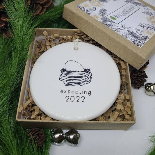 Ornament Expecting, Egg, Minimalist Ornament, Bump Ornament, New Parents, Reveal Ornament - egg in a nest with the year - choice of color