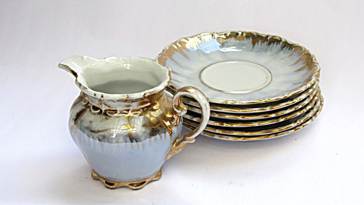 Porcelain creamer and saucers. Lusterware gold trim tea set. Bavaria crown milk pitcher and 6 small plates. Vintage.