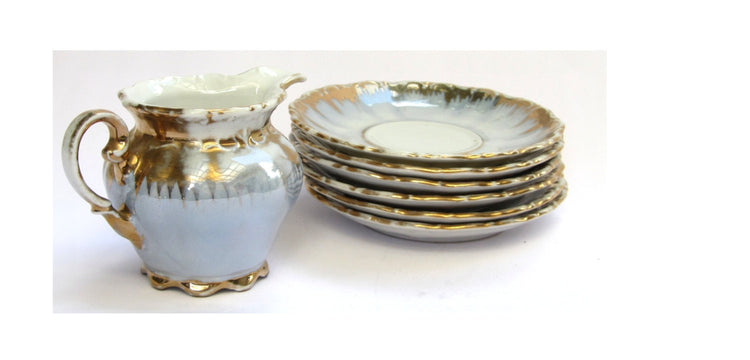 Porcelain creamer and saucers. Lusterware gold trim tea set. Bavaria crown milk pitcher and 6 small plates. Vintage.