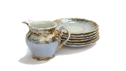 Porcelain creamer and saucers. Lusterware gold trim tea set. Bavaria crown milk pitcher and 6 small plates. Vintage.