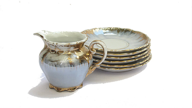 Porcelain creamer and saucers. Lusterware gold trim tea set. Bavaria crown milk pitcher and 6 small plates. Vintage.