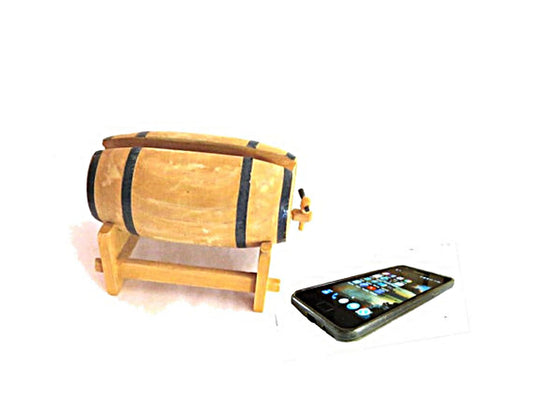 Phone stand. Hand crafted wood. Man cave bar. Cell phone holder. Docking station.Cell phone charging station. Shaped as a wine barrel.