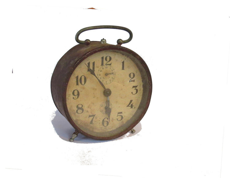 Vintage clock. Antique clock. Metal clock. Rusty metal. Alarm clock. Alarm clock vintage. Desk clock. Mechanical clock. Old clock. Italian.