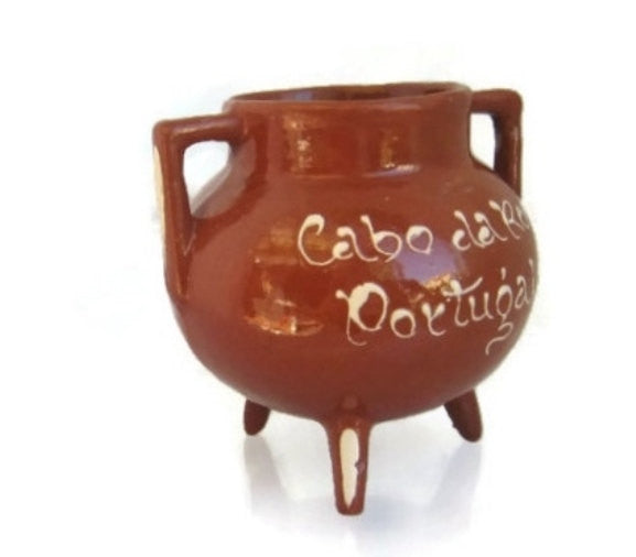 Portuguese handmade floral pottery. Made in Cabo da roca. Brown ceramics with white inscription.