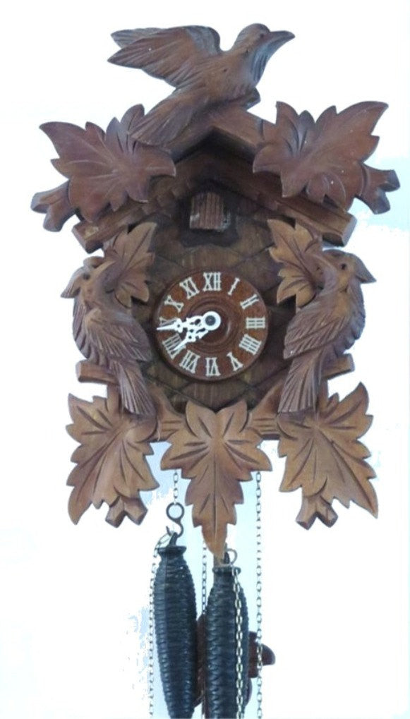 Black forest. Wood clock. Wooden clock. Wood wall clock. Mechanical clock. Cuckoo clock. Bird clock. Hand carved. Working.