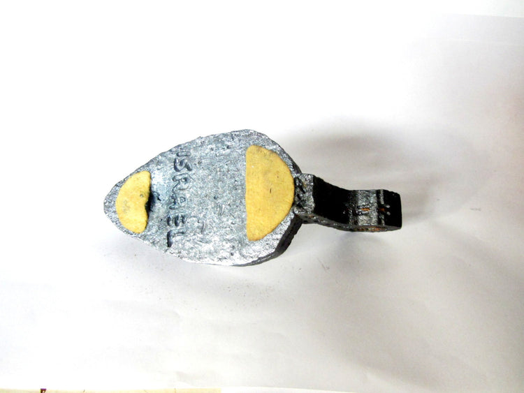 Cast metal candle holder. Shaped as an ancient oil lamp. Made in israel by amir. Vintage.