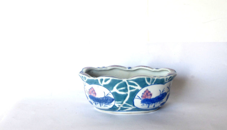 Asian ceramic planter. Small planter.Floral pottery flower pot. Lotus flowers are painted on the outside.