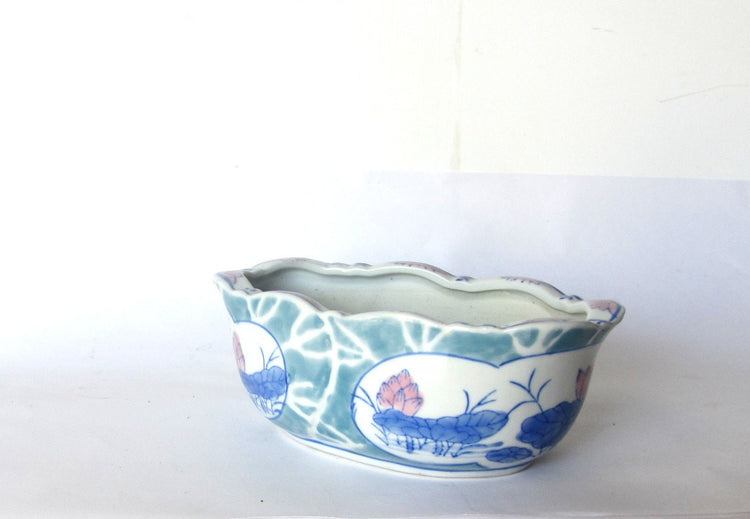 Asian ceramic planter. Small planter.Floral pottery flower pot. Lotus flowers are painted on the outside.