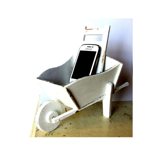 Cell phone charging station. Hand made wood wheelbarrow. White distressed shabby wooden charging station.