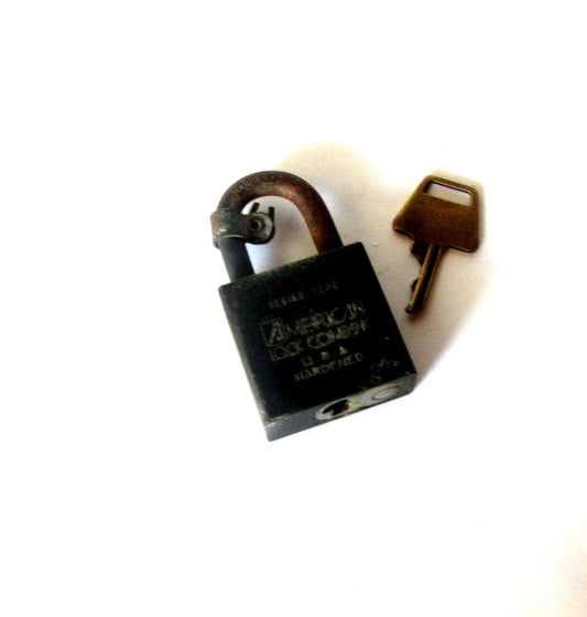 Padlock. Old metal lock. Rusty metal. Us army and government official lock. Made by the American lock company. Series 5200. Vintage.