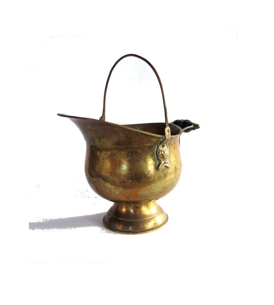 Metal bucket. Brass bucket. Scuttle. Coal scuttle. Lion heads handle. Brass handles. wood handle. Pedestal. Metal planter. Brass planter.
