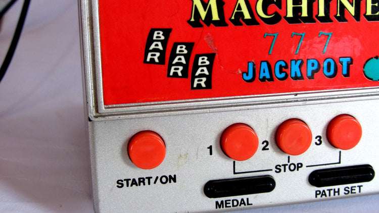 Electronic game. Las vegas. Electronic toy. Casino. Gambling. Gambling gift. Slot machine. Arcade game. Vintage electronic slot machine toy.